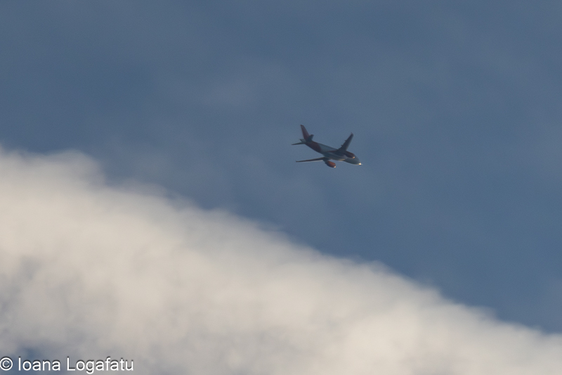 Majestic aircraft gliding through a clear sky